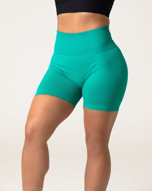 A woman wearing the best workout shorts for women