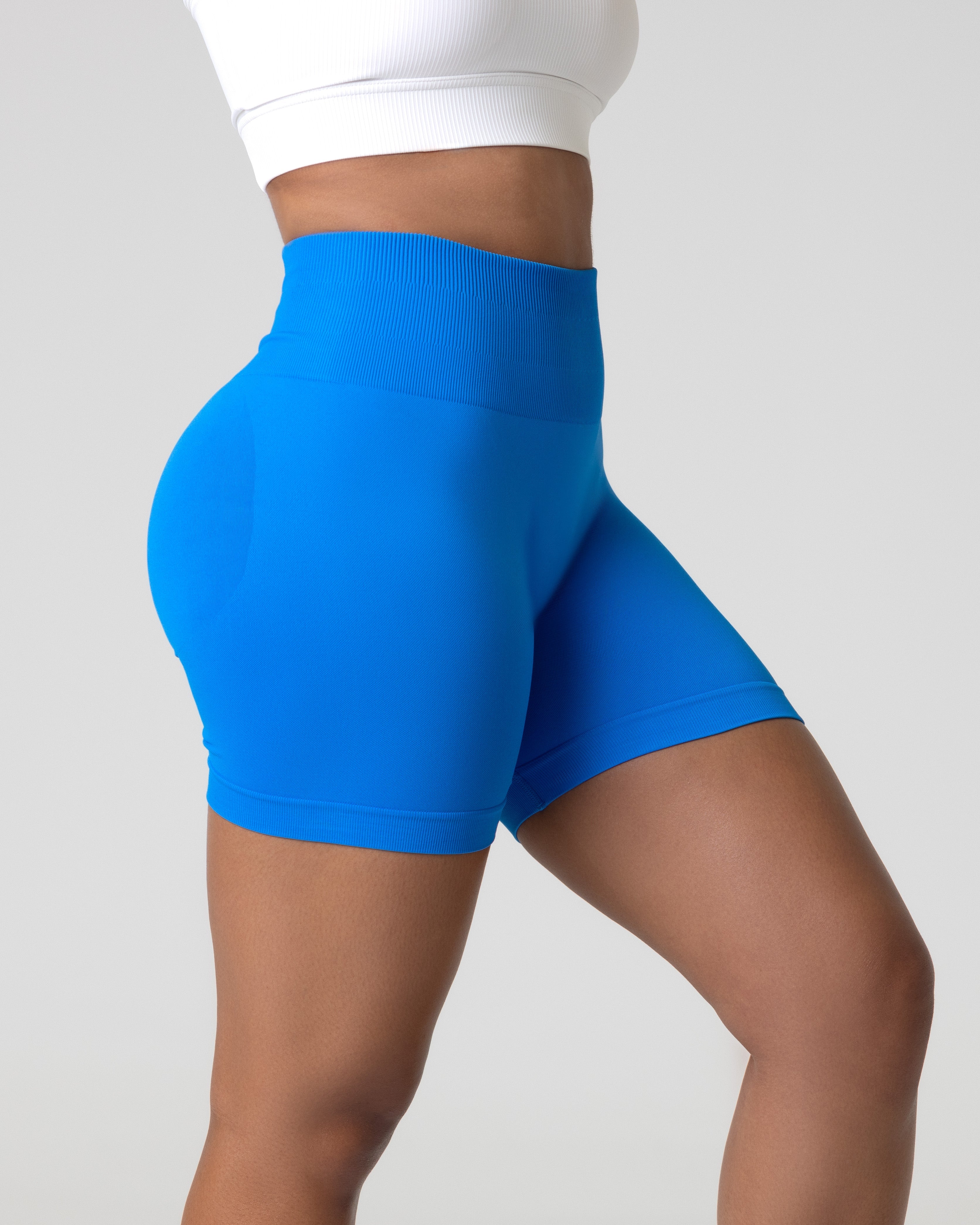 A woman wearing women's scrunch booty shorts