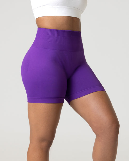 a woman wearing women's scrunch butt sportswear shorts